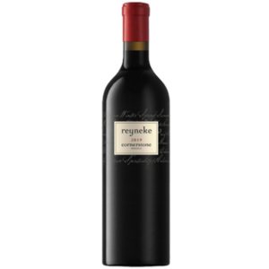 A dark wine bottle with a red cap and a cream label reading reyneke 2019 cornerstone in black and gold text, set against a plain white background—one of the South African Rare Icon Wines.
